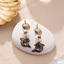Load image into Gallery viewer, Paparazzi ~ Delightful Dolphin ~ Gold Earrings