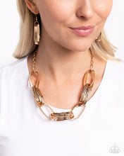 Load image into Gallery viewer, Paparazzi ~ Fiercely Flexing ~ Gold Necklace Set
