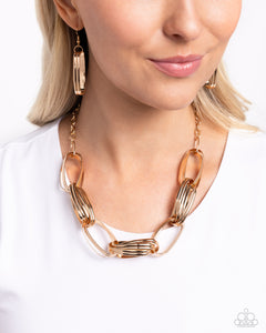 Paparazzi ~ Fiercely Flexing ~ Gold Necklace Set