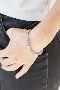 Paparazzi ~ Glitzy Gleam ~ White Bracelet (Life of the Party Exclusive)