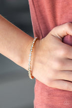 Load image into Gallery viewer, Paparazzi ~ Seven Figure Fabulous ~ Gold Bangle Bracelet